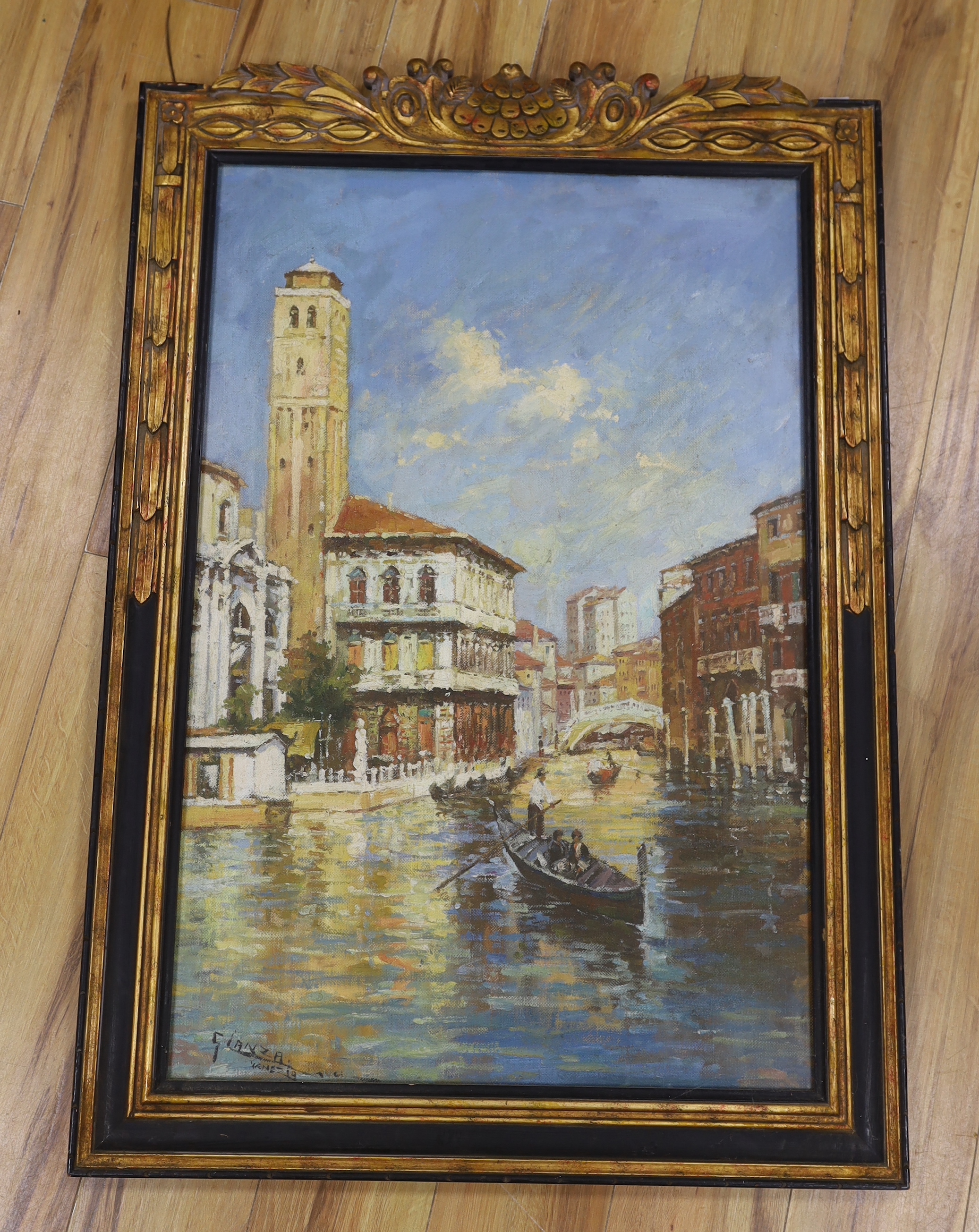 After Giovanni Lanza (1827-1889), oil on canvas board, Venetian canal with gondoliers, bears signature, 89 x 60cm, ornate gilt frame